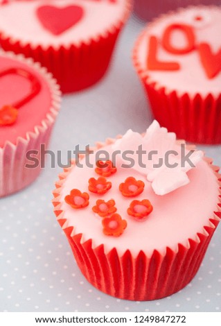 Still life Christmas celebration cupcakes with love symbols, home interior. Dessert cooking heart shape sugar food, restaurant sweet eating celebrarion flavour, wedding anniversary.