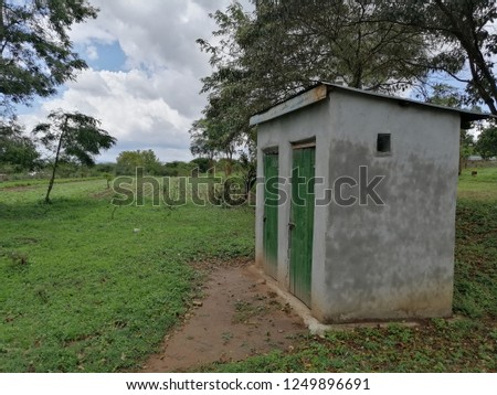 A pit latrine in an African farm in Machakos County, Nairobi Royalty-Free Stock Photo #1249896691