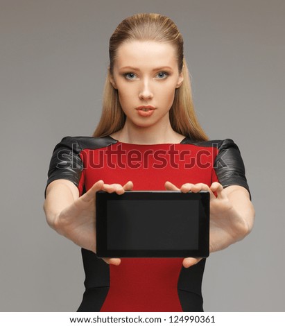 bright picture of futuristic woman with tablet pc