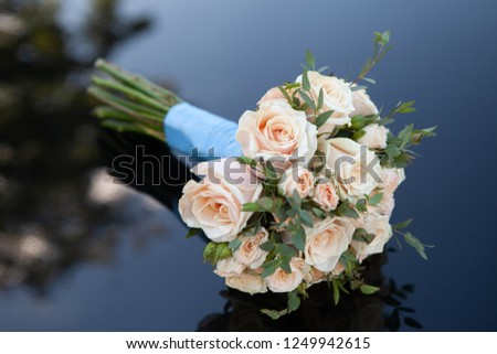 bouquet of pink roses on a black background
