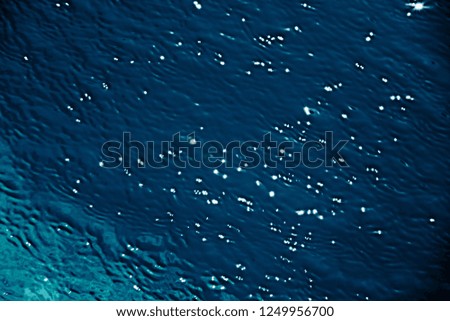scenery blurred vision of water feature by reflection of daylight on water surface at outdoor swimming pool in close up and minimal style so beautiful outdoor pattern for artistic nature background