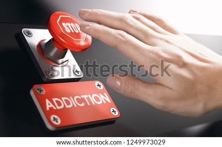 Woman pressing a panic button with stop sign to overcome addiction or dependence problems. Psychology concept. Royalty-Free Stock Photo #1249973029