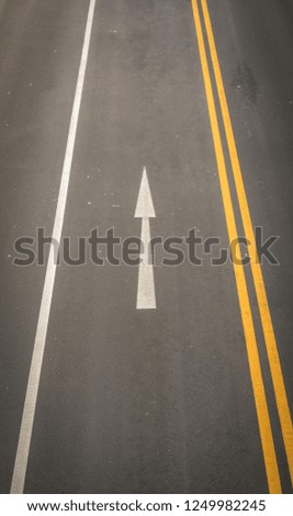 Arrow symbols on the road
