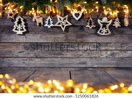 Christmas rustic background with wooden decoration. Free space for text. Celebration and decorative design.
