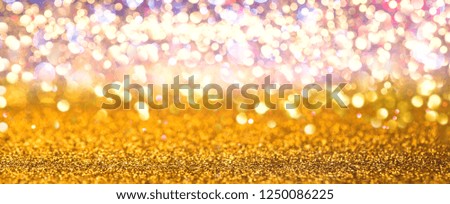gold glitter lights texture background. defocused