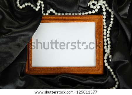 empty frame on beautiful silk