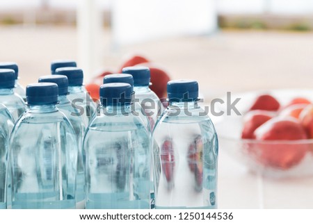 a series of bottles of mineral water in bright colors