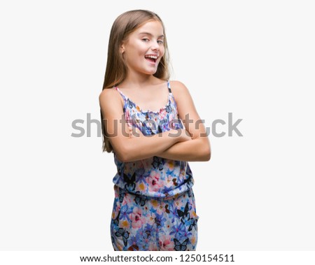 Young beautiful girl wearing colorful dress over isolated background happy face smiling with crossed arms looking at the camera. Positive person.