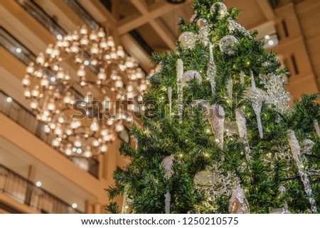 A Christmas tree decorated at hotel lobby.