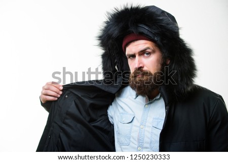 Prepared for weather changes. Winter stylish menswear. Winter outfit. Man bearded stand warm jacket parka isolated on white background. Hipster winter fashion. Guy wear black winter jacket with hood.