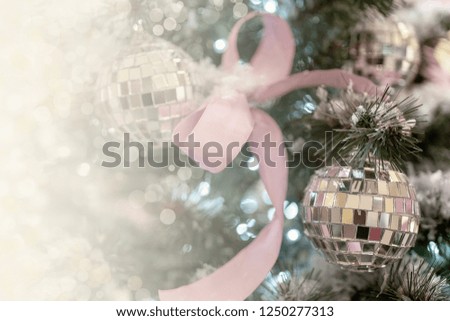 Christmas background - branches, toys, highlights. Place for congratulations.