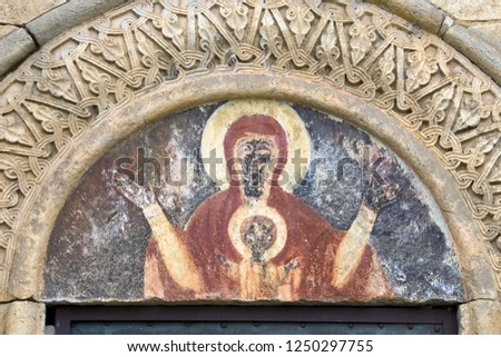Ancient painting (Icon) above the entrance to the church in the Gelati Monastery (built from the 11th to the 13th century) near Kutaisi, Imereti, Georgia.