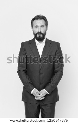 Some problems. Man bearded business man or manager feel some problems. Man surprised face feels awkward, yellow background. Guy mature formal suit got problems at work or in business.