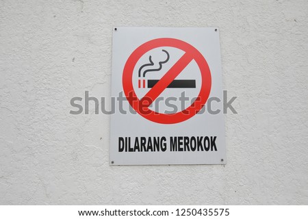No smoking sign Malaysia. Translation for Malay - No smoking.