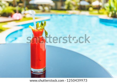 Bloody Mary cocktail at the resort bar or suite patio. Luxury resort, vacation, room service concept. Horizontal