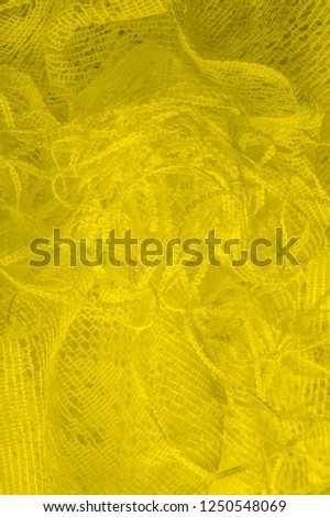 Texture, background, pattern. yellow tulle. With a simple design idea, create a couture look that refers to the softness of spring. In a collection of beautiful shades, how could you say no?