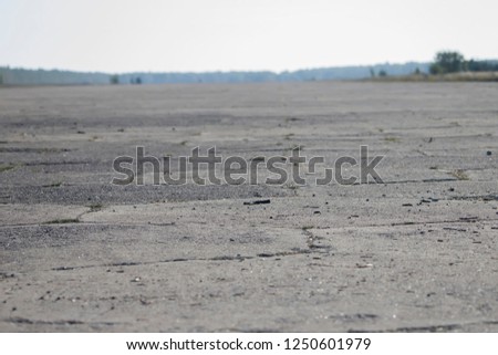 Old runway. Strip of old asphalt