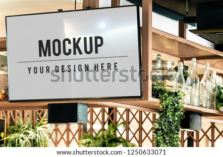 TV screen mockup in a restaurant Royalty-Free Stock Photo #1250633071