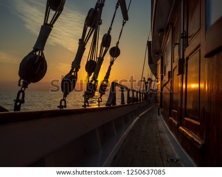 Sunset at the Sailboat deck while cruising in the Cyclades in Greece