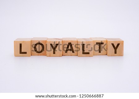 Loyalty Word Written In Wooden Cube