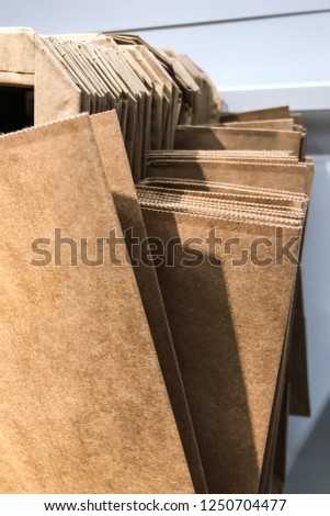 Paper bags hanging for sales