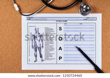 Patient SOAP note sheet, stethoscope and pen on corkwood background. Flat lay. Royalty-Free Stock Photo #1250724460