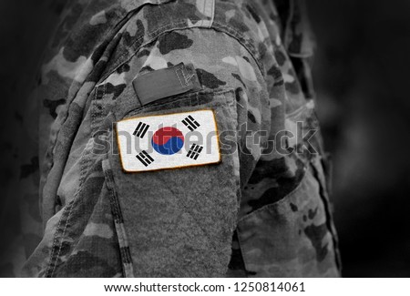 Flag of South Korea on soldiers arm. Flag of South Korea on military uniforms (collage). Royalty-Free Stock Photo #1250814061