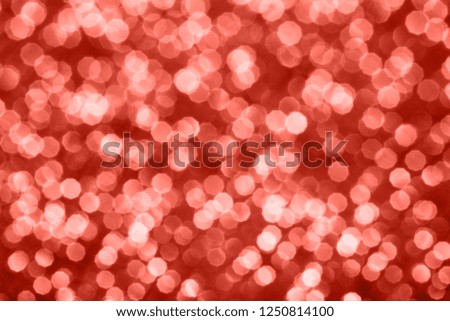 Living Coral glitter bokeh background. Color of the year 2019. Main trend concept. Natural and authentic mood.