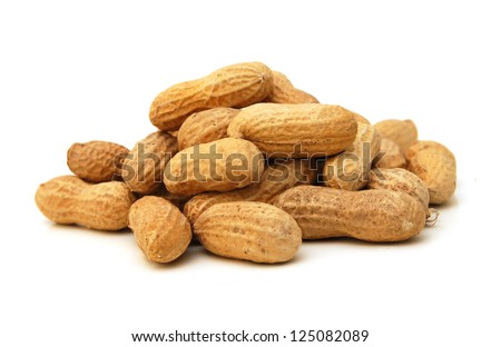 Dried peanuts in closeup on white Royalty-Free Stock Photo #125082089