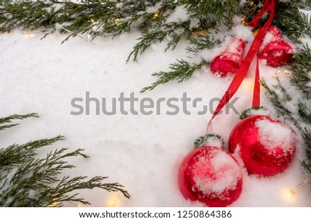 Christmas and New year background. Snowflake, Christmas tree and ball on white snow background.