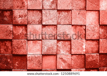 Stone wall made with squares. Living Coral Color of the year 2019. Main trend concept.