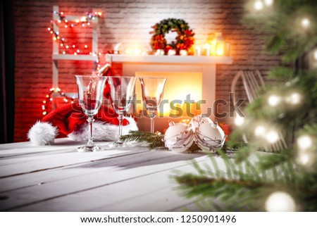 Table background of free space with christmas tree and fireplace 