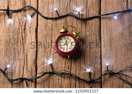 Happy New Year - Wooden background. Clock