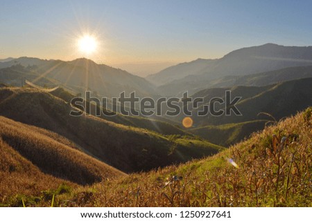  Beautiful Sunset at hillside Royalty-Free Stock Photo #1250927641