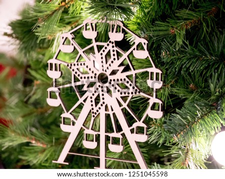 Small Ferris wheel on the Christmas tree.