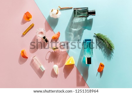 Perfume bottles with different fragrances for men and women Royalty-Free Stock Photo #1251318964