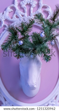 close up deer head with christmas tree horns 