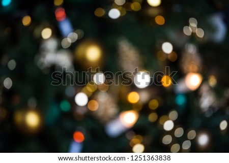 Abstract christmas background with colorful bokeh light effects