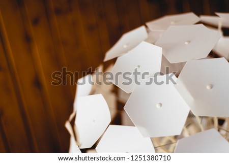 Geometric pieces of a ceiling lamp.