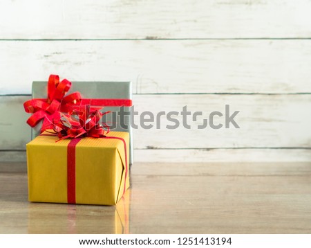 Christmas, New Year Present Gift Box with White Wood Background, Using for Template Design Concept.