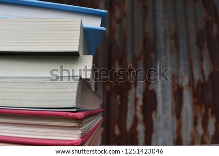 Stack of books background.many books piles.