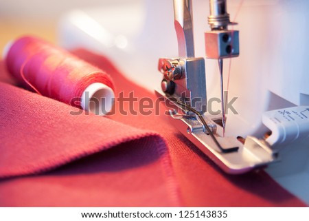 sewing process in the phase of overstitching Royalty-Free Stock Photo #125143835