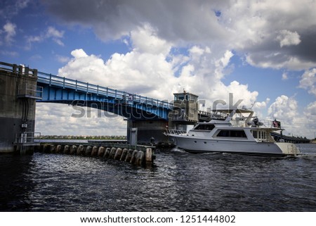 Ship Passing Under Bridge