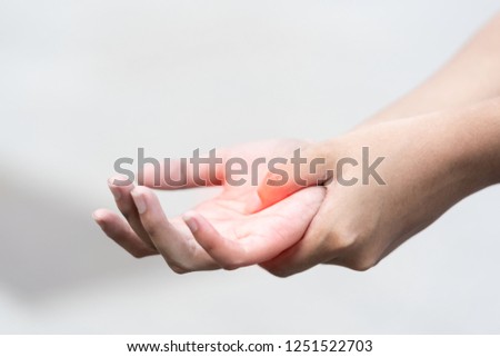 close up of Pain or Massage in the palm. woman having pain in injured hand. hands suffering from working. muscle pain, office syndrome,Beriberi ,lifestyle ,healthcare and medical concept
