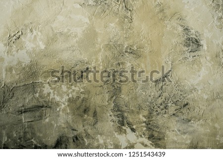 Complex, incomprehensible, original and interesting texture, pattern and background of unevenly laid old and vintage plaster and concrete solution with stains and strokes.