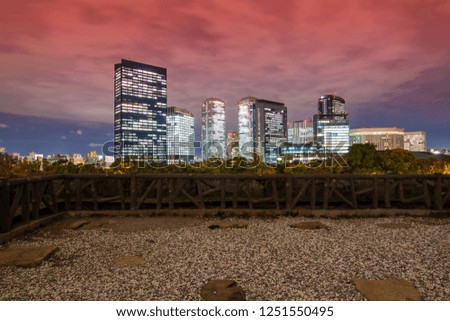 The empty terrace with the  building architecture  for showcasing in sunset, sunrise time at Osaka, Japan.
