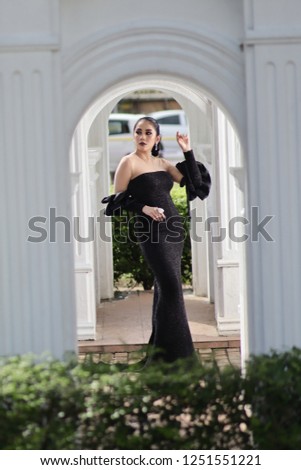 Beautiful Asia  women in high fashion black dress. Dinner dress and Ball gown dress idea.