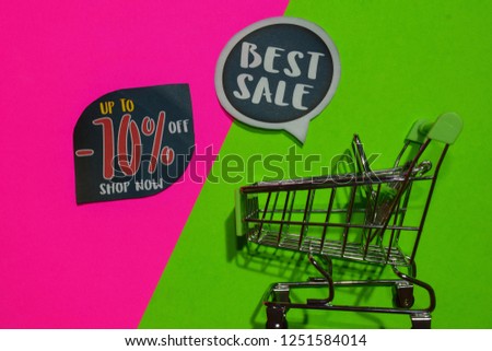 Up To -70% Off Shop Now and Best Sale Text and Shopping cart. Discount and promotion business concept on colorful background