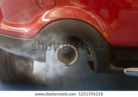 Close-up car exhaust pipe