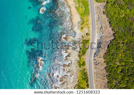 Top down aerial view of Great Ocean Road in Australia Royalty-Free Stock Photo #1251608323